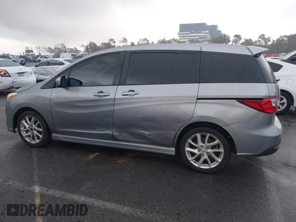 2012 Mazda 5 Touring с VIN JM1CW2CLXC0126576, выставлен на аукционе IAAI как лот 41759917 с пробегом 144 596 миль миль и . История ставок и продаж доступна на DreamBid. Изображение 14.