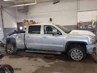 2017 GMC Sierra 2500HD Denali with VIN 1GT12UEY5HF249200, listed as a IAAI auction lot 41345624 with 243,166 mi miles. Bid and sale history available at carsss.com. Image 13.