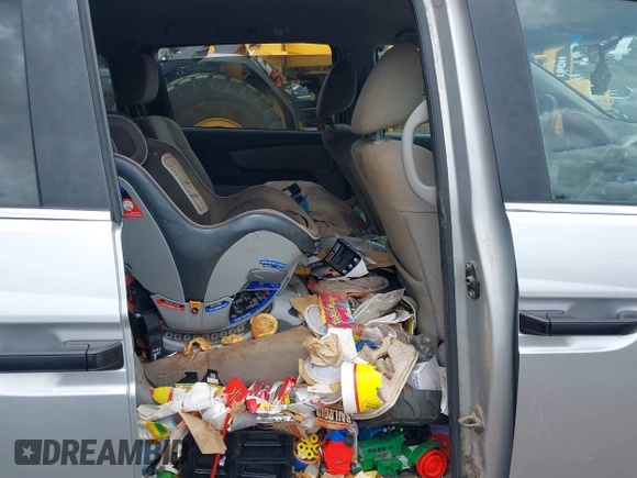 2011 Honda Odyssey LX with VIN 5FNRL5H26BB027144, listed as a IAAI auction lot 42456465 with 201,901 mi miles and . Bid and sale history available at DreamBid. Image 8.