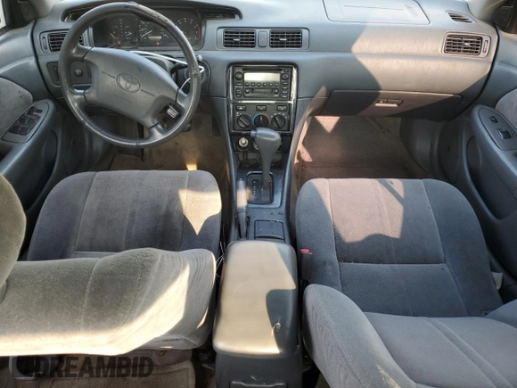 2001 Toyota Camry LE z VIN JT2BF22K010297055, wystawiony jako Copart lot #59510645 z przebiegiem 265 428 mil mil oraz Szkoda całkowita • Salvage title. Historia ofert i sprzedaży dostępna na DreamBid. Obrazek 8.