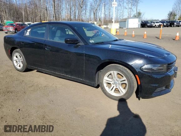 2015 Dodge Charger SE with VIN 2C3CDXBGXFH870769, listed as a Copart auction lot 53486975 with 102,323 mi miles and Salvage Title. Bid and sale history available at carsss.com. Image 4.
