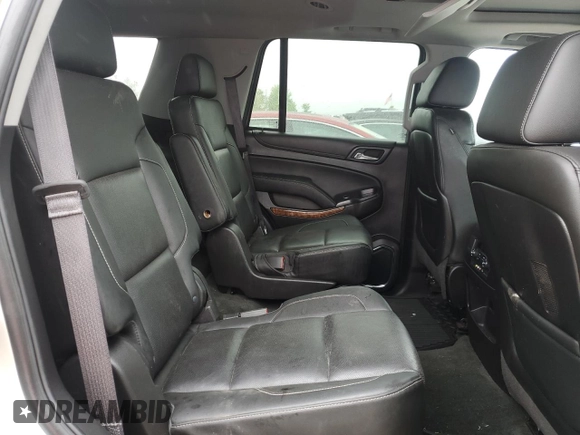 2015 Chevrolet Tahoe LTZ z VIN 1GNSKCKC5FR100084, wystawiony jako Copart lot #57677825 z przebiegiem 141 987 mil mil oraz Czysty tytuł • Clean title. Historia ofert i sprzedaży dostępna na DreamBid. Obrazek 11.