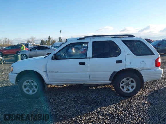 2001 Isuzu Rodeo S with VIN 4S2DM58W014335513, listed as a IAAI auction lot 41529329 with 173,891 mi miles and . Bid and sale history available at DreamBid. Image 15.