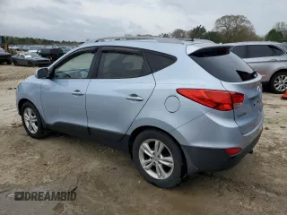2011 Hyundai Tucson Limited with VIN KM8JUCAC8BU196358, listed as a Copart auction lot 51111975 with 200,439 mi miles and Salvage Title. Bid and sale history available at DreamBid. Image 2.