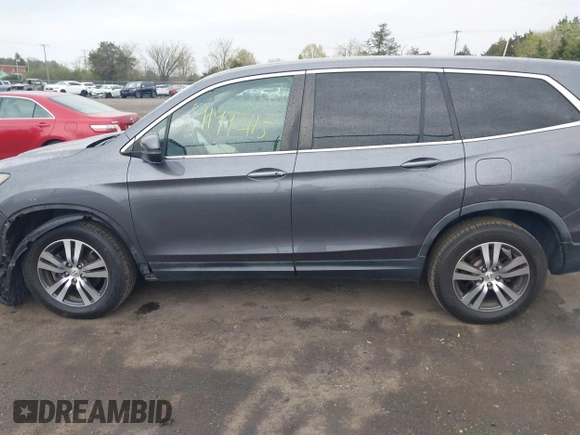 2017 Honda Pilot EX-L with VIN 5FNYF6H5XHB029443, listed as a IAAI auction lot 41992115 with 154,399 mi miles and . Bid and sale history available at DreamBid. Image 14.