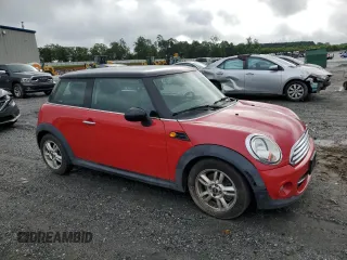 2013 MINI Hardtop with VIN WMWSU3C56DT678503, listed as a Copart auction lot 61062585 with 96,564 mi miles and Clean title. Bid and sale history available at DreamBid. Image 4.