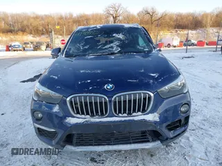 2019 BMW X1 xDrive28i z VIN WBXHT3C54K5L36472, wystawiony jako IAAI lot #41391927 z przebiegiem 88 950 mil mil oraz . Historia ofert i sprzedaży dostępna na DreamBid. Obrazek 13.