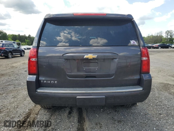 2015 Chevrolet Tahoe LTZ with VIN 1GNSKCKC9FR698924, listed as a Copart auction lot 56196895 with 184,740 mi miles and Salvage title. Bid and sale history available at DreamBid. Image 6.