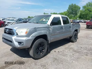 2015 Toyota Tacoma PreRunner with VIN 3TMJU4GN9FM179890, listed as a IAAI auction lot 42225923 with 160,000 mi miles and . Bid and sale history available at DreamBid. Image 2.