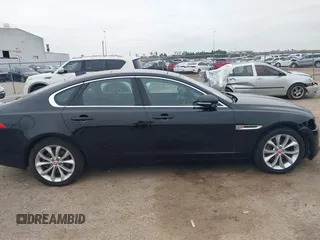 2019 Jaguar XF 25t Premium with VIN SAJBJ4FX5KCY78947, listed as a IAAI auction lot 41261473 with 68,891 mi miles. Bid and sale history available at carsss.com. Image 14.