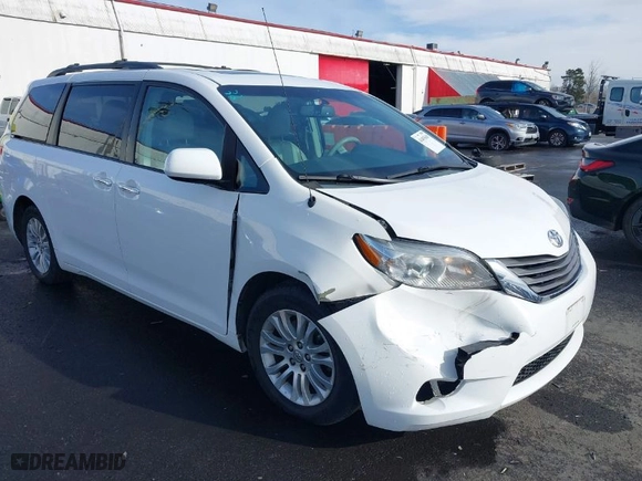 2012 Toyota Sienna XLE AAS with VIN 5TDYK3DC7CS267673, listed as a IAAI auction lot 41493549 with 176,845 mi miles. Bid and sale history available at carsss.com. Image 6.