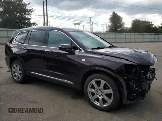 2020 Cadillac XT6 AWD Premium Luxury with VIN 1GYKPDRS0LZ134789, listed as a Copart auction lot 60782245 with 61,138 mi miles and Salvage title. Bid and sale history available at DreamBid. Image 4.