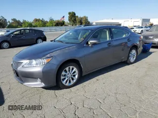 2013 Lexus ES 300h with VIN JTHBW1GGXD2033631, listed as a Copart auction lot 64521415 with 70,332 mi miles and Clean title. Bid and sale history available at DreamBid. Image 1.