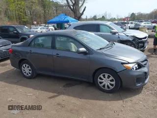 2011 Toyota Corolla L with VIN 2T1BU4EE4BC542333, listed as a IAAI auction lot 42122502 with 100,331 mi miles. Bid and sale history available at carsss.com. Image 13.
