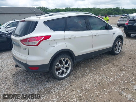 2016 Ford Escape Titanium z VIN 1FMCU9J90GUC76504, wystawiony jako IAAI lot #42552851 z przebiegiem 89 570 mil mil oraz . Historia ofert i sprzedaży dostępna na DreamBid. Obrazek 4.