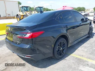 2025 Toyota Camry LE with VIN 4T1DAACK8SU125496, listed as a IAAI auction lot 42206200 with 937 mi miles and . Bid and sale history available at DreamBid. Image 4.