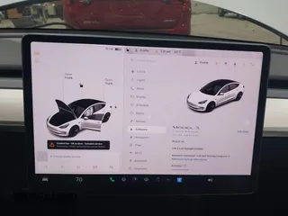 2021 Tesla Model 3 Long Range with VIN 5YJ3E1EBXMF051060, listed as a IAAI auction lot 41958018 with 65,631 mi miles. Bid and sale history available at carsss.com. Image 18.