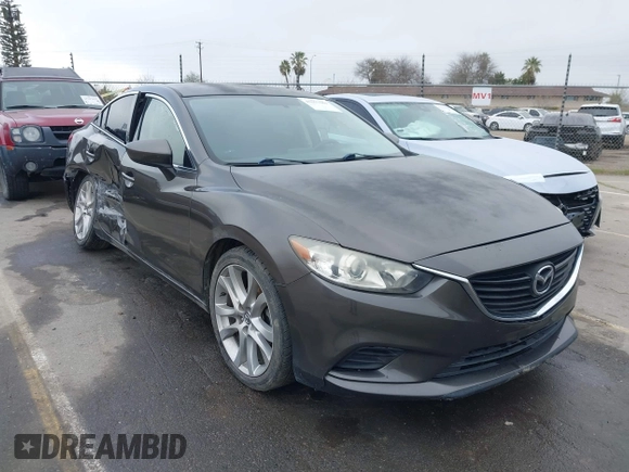 2016 Mazda 6 i Touring with VIN JM1GJ1V52G1473330, listed as a IAAI auction lot 41657684 with 138,064 mi miles and . Bid and sale history available at DreamBid. Image 1.