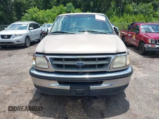 1998 Ford F-150 with VIN 1FTZX1760WNB21027, listed as a IAAI auction lot 42651506 with 189,442 mi miles and . Bid and sale history available at DreamBid. Image 6.
