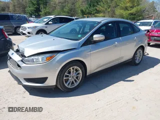 2017 Ford Focus SE z VIN 1FADP3F21HL237412, wystawiony jako IAAI lot #42188886 z przebiegiem 148 355 mil mil oraz . Historia ofert i sprzedaży dostępna na DreamBid. Obrazek 2.