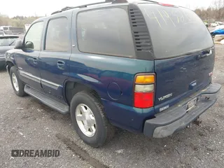 2005 GMC Yukon SLT with VIN 1GKEK13T15R196436, listed as a IAAI auction lot 41952646 with 247,487 mi miles. Bid and sale history available at carsss.com. Image 3.