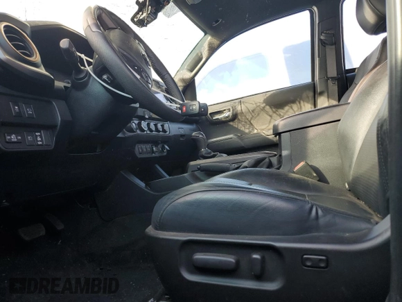 2023 Toyota Tacoma SR with VIN 3TMCZ5AN0PM538974, listed as a Copart auction lot 89165095 with 31,281 mi miles and Salvage title. Bid and sale history available at DreamBid. Image 7.