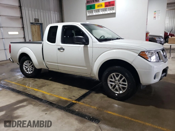 2014 Nissan Frontier SV with VIN 1N6AD0CUXEN736068, listed as a Copart auction lot 51046865 with 115,472 mi miles and Salvage title. Bid and sale history available at DreamBid. Image 4.