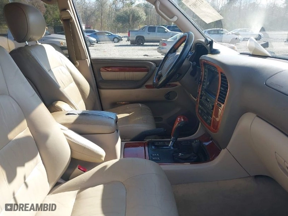 2002 Lexus LX 470 with VIN JTJHT00W123522570, listed as a IAAI auction lot 41739017 with 266,396 mi miles. Bid and sale history available at carsss.com. Image 5.