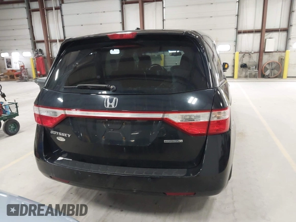 2011 Honda Odyssey Touring with VIN 5FNRL5H9XBB055008, listed as a IAAI auction lot 41973447 with 218,762 mi miles and . Bid and sale history available at DreamBid. Image 16.