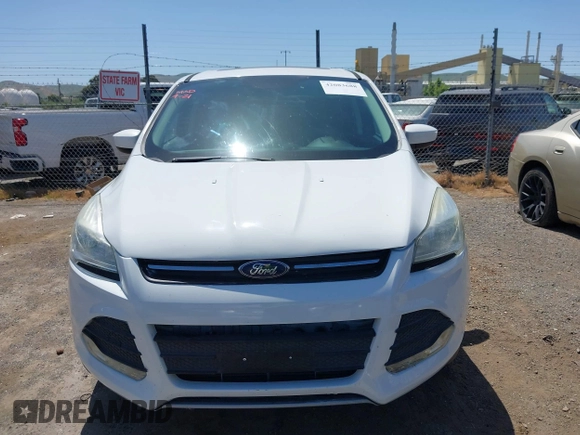 2015 Ford Escape SE with VIN 1FMCU0G91FUC65044, listed as a IAAI auction lot 42083688 with 111,972 mi miles and . Bid and sale history available at carsss.com. Image 13.