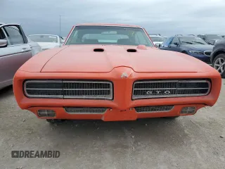 1969 Pontiac GTO z VIN 242379P309028, wystawiony jako Copart lot #75516494 z przebiegiem 597 mil mil oraz Nie do naprawy • Non repairable. Historia ofert i sprzedaży dostępna na DreamBid. Obrazek 5.