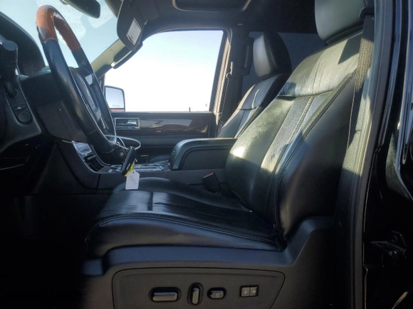 2016 Lincoln Navigator L with VIN 5LMJJ3HTXGEL08591, listed as a Copart auction lot 70049694 with 123,971 mi miles and Salvage Title. Bid and sale history available at carsss.com. Image 7.