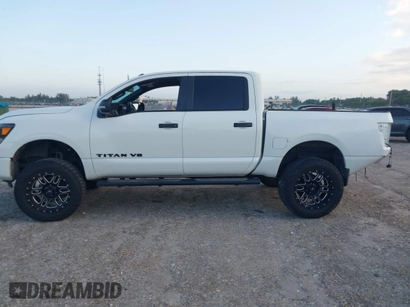 2019 Nissan Titan Pro-4X z VIN 1N6AA1E52KN534356, wystawiony jako IAAI lot #41998653 z przebiegiem 95 052 mil mil oraz . Historia ofert i sprzedaży dostępna na DreamBid. Obrazek 15.
