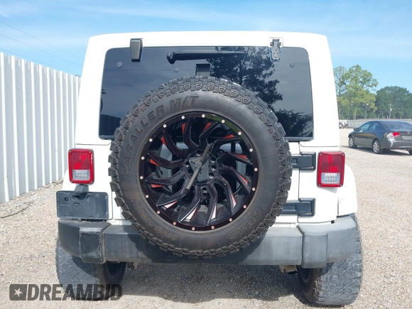 2012 Jeep Wrangler Unlimited Sahara with VIN 1C4BJWEG1CL186407, listed as a IAAI auction lot 42593848 with 178,354 mi miles and . Bid and sale history available at DreamBid. Image 16.