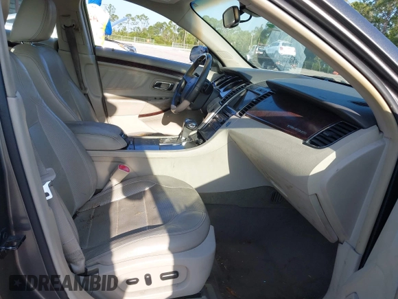 2011 Ford Taurus Limited with VIN 1FAHP2FW3BG117688, listed as a IAAI auction lot 41974469 with 215,036 mi miles and . Bid and sale history available at carsss.com. Image 5.