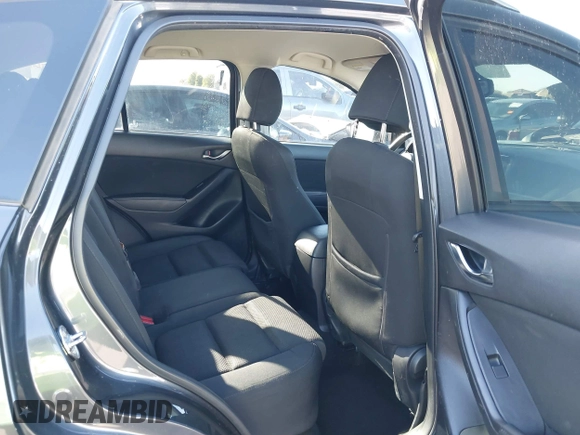 2016 Mazda CX-5 Touring with VIN JM3KE2CY4G0695947, listed as a IAAI auction lot 41824490 with 162,191 mi miles and . Bid and sale history available at carsss.com. Image 8.