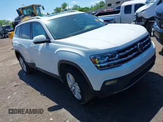 2019 Volkswagen Atlas SE z VIN 1V2UR2CA2KC590287, wystawiony jako IAAI lot #42170993 z przebiegiem 88 971 mil mil oraz . Historia ofert i sprzedaży dostępna na DreamBid. Obrazek 1.