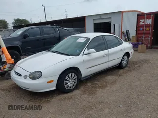 1998 Ford Taurus LX z VIN 1FAFP52U7WA146892, wystawiony jako IAAI lot #42313955 z przebiegiem 133 743 mil mil oraz . Historia ofert i sprzedaży dostępna na DreamBid. Obrazek 2.