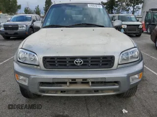 1999 Toyota RAV4 with VIN JT3GP10V0X7054819, listed as a Copart auction lot 44864015 with 140,095 mi miles and Salvage Title. Bid and sale history available at DreamBid. Image 5.