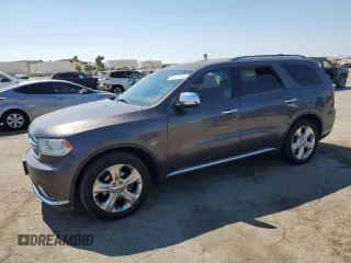 2015 Dodge Durango SXT with VIN 1C4RDHAG4FC127816, listed as a Copart auction lot 64864055 with 134,780 mi miles and Salvage title. Bid and sale history available at DreamBid. Image 1.