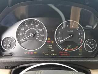 2014 BMW 4 Series 428i z VIN WBA3V5C54EP747860, wystawiony jako Copart lot #56187905 z przebiegiem 117 616 mil mil oraz Szkoda całkowita • Salvage title. Historia ofert i sprzedaży dostępna na DreamBid. Obrazek 9.