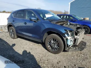 2017 Mazda CX-5 Touring with VIN JM3KFBCL4H0208376, listed as a Copart auction lot 48529895 with 71,689 mi miles and Salvage Title. Bid and sale history available at carsss.com. Image 4.