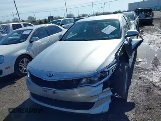 2016 Kia Optima LX with VIN 5XXGT4L34GG078857, listed as a IAAI auction lot 41819971 with 112,963 mi miles. Bid and sale history available at carsss.com. Image 12.