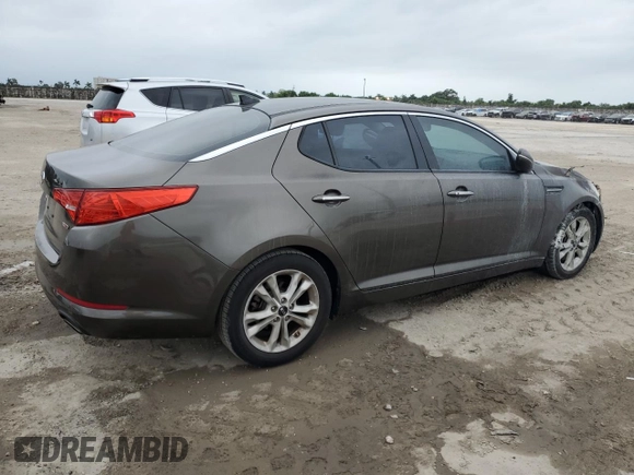 2011 Kia Optima EX with VIN KNAGN4A65B5139487, listed as a Copart auction lot 76731764 with Not Provided miles and Salvage Title. Bid and sale history available at carsss.com. Image 3.