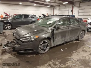 2018 Ford Fusion Hybrid Titanium with VIN 3FA6P0RU4JR147831, listed as a IAAI auction lot 41586033 with 101,088 mi miles. Bid and sale history available at carsss.com. Image 2.