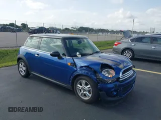 2013 MINI Hardtop with VIN WMWSU3C58DT548044, listed as a IAAI auction lot 42622006 with 99,754 mi miles and . Bid and sale history available at DreamBid. Image 1.