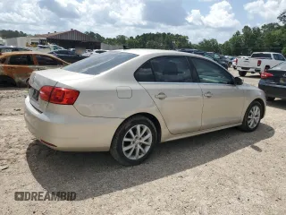 2014 Volkswagen Jetta SE z VIN 3VWD07AJ4EM299401, wystawiony jako Copart lot #61756715 z przebiegiem 133 246 mil mil oraz Szkoda całkowita • Salvage title. Historia ofert i sprzedaży dostępna na DreamBid. Obrazek 3.