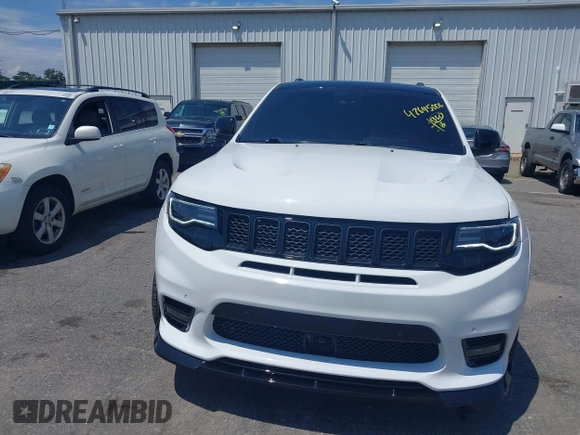 2019 Jeep Grand Cherokee Summit with VIN 1C4RJFJT1KC785744, listed as a IAAI auction lot 42645006 with 38,483 mi miles and . Bid and sale history available at DreamBid. Image 6.