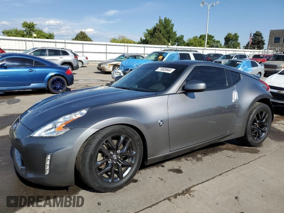 2015 Nissan 370Z with VIN JN1AZ4EH2FM444159, listed as a Copart auction lot 71005944 with 54,063 mi miles and Salvage Title. Bid and sale history available at carsss.com. Image 1.