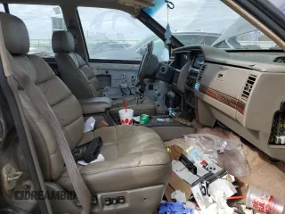 1993 Jeep Grand Wagoneer z VIN 1J4GZ88Y6PC711184, wystawiony jako Copart lot #46785895 z przebiegiem 280 127 mil mil oraz Czysty tytuł • Clean title. Historia ofert i sprzedaży dostępna na DreamBid. Obrazek 7.